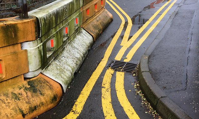 FROM JOHN JEFFAY AT CASCADE NEWS LTD    0161 660 8087 /  07771 957773  john@cascadenews.co.uk / www.cascadenews.co.uk Syndicated for Dundee Courier with pic A HAPLESS council worker tried painting two sets of double yellow lines in this 2ft-wide gap. The road in Anstruther, Fife, is far too narrow to park any car, and the yellow mess has left locals baffled. The markings are beside a collapsed wall, which crumbled eight years ago causing St Ayles Crescent to be closed at one end.   Its the craziest set of double yellow lines Ive ever seen. Its been quite a subject of conversation, said local Martin Dibley, secretary of  Anstruther Community Council  There have been lengthy wrangles over who is responsible for mending the structure and it remains fenced off.